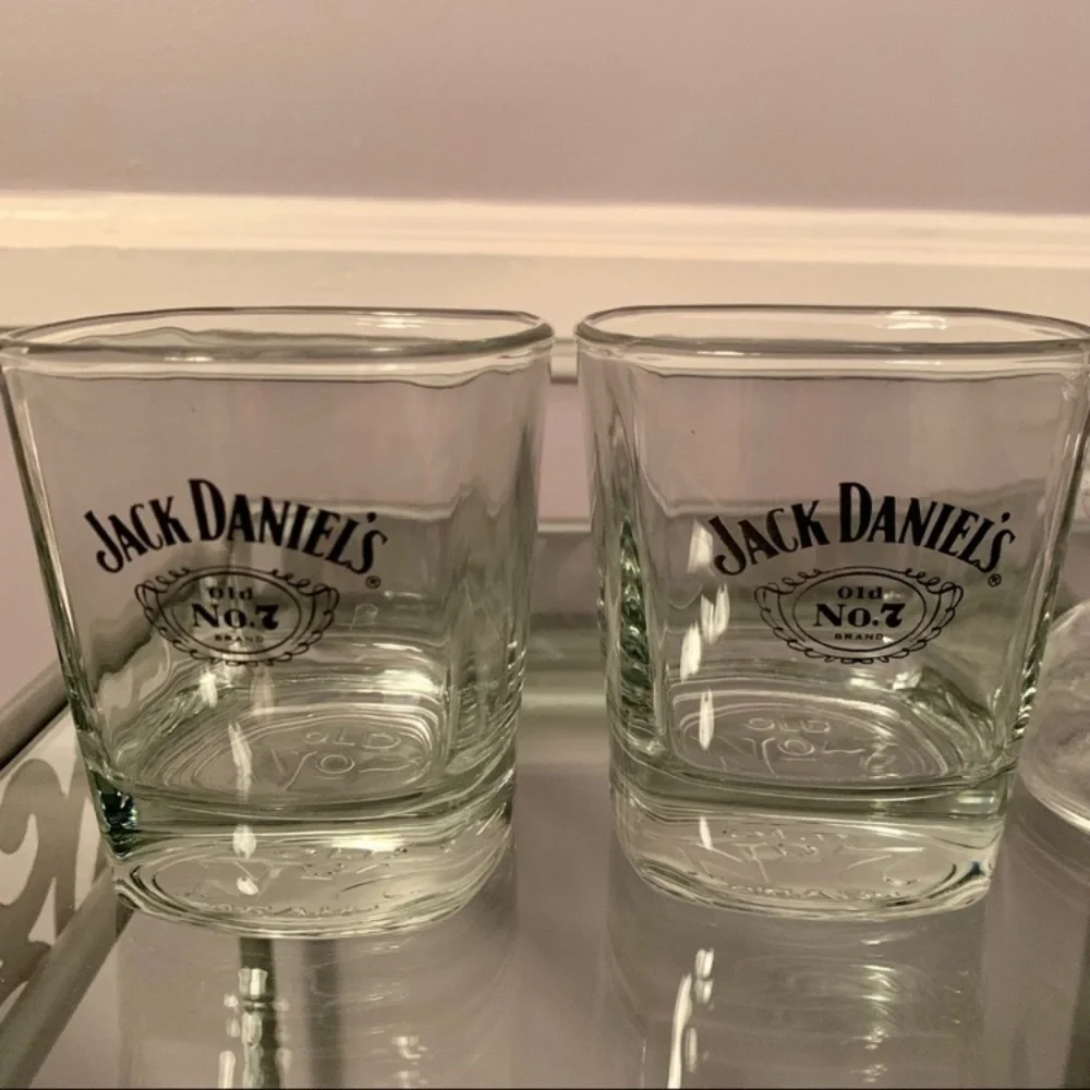 3 bar glasses including 2 square Jack Daniels and 1 Gentlemen Jack tumbler
